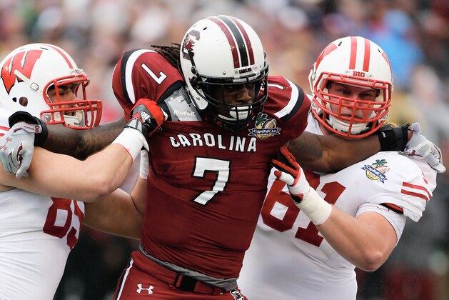 ORLANDO, FL - JANUARY 01:  Jadeveon Clowney #7 of the South Carolina Gamecocks in action during their game against the Wisconsin Badgers at the Capital One Bowl on January 1, 2014 in Orlando, Florida.  (Photo by Scott Halleran/Getty Images)