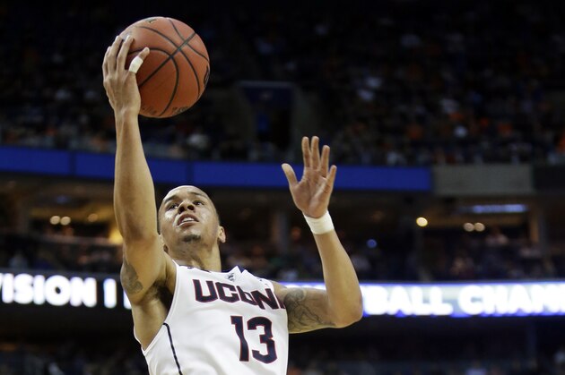 Connecticut's Shabazz Napier drives to the basket during the second half of a second-round game against Saint Joseph's in the NCAA college basketball tournament in Buffalo, N.Y., Thursday, March 20, 2014. (AP Photo/Nick LoVerde) Connecticut's Shabazz Napier drives to the basket during the second half of a second-round game against Saint Joseph's in the NCAA college basketball tournament in Buffalo, N.Y., Thursday, March 20, 2014. (AP Photo/Nick LoVerde)