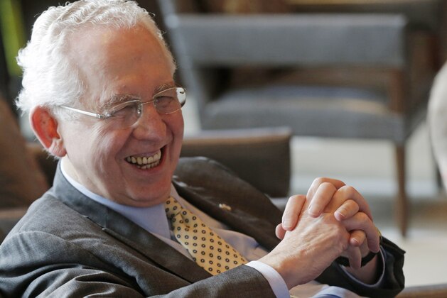 Southeastern Conference Commissioner Mike Slive talks with reporters during the SEC NCAA college basketball media day in Birmingham, Ala., Thursday, Oct. 17, 2013. (AP Photo/Dave Martin)