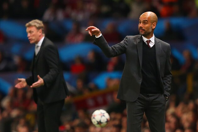 MANCHESTER, ENGLAND - APRIL 01:  David Moyes manager of Manchester United and Pep Guardiola head coach of Bayern Muenchen give instructions during the UEFA Champions League Quarter Final first leg match between Manchester United and FC Bayern Muenchen at Old Trafford on April 1, 2014 in Manchester, England.  (Photo by Alex Livesey/Getty Images)