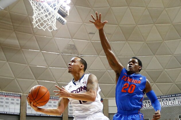 STORRS, CT - DECEMBER 02:  Shabazz Napier #13 of the Connecticut Huskies goes up for a layup against the Florida Gators in the second half during the game at Harry A. Gampel Pavilion on December 2, 2013 in Storrs, Connecticut.  (Photo by Jared Wickerham/Getty Images)