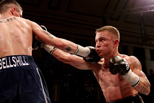 LONDON, ENGLAND - JANUARY 28:  Carl Frampton (R) in action with Kris Hughes during the Commonwealth Super-Bantamweight Championship bout at York Hall on January 28, 2012 in London, England.  (Photo by Scott Heavey/Getty Images)