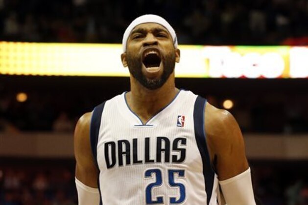 Dallas Mavericks guard/forward Vince Carter (25) shouts after scoring the final points of Dallas' 103-98 win in an NBA basketball game against the Portland Trail Blazers on Friday, March 7, 2014, in Dallas. (AP Photo/John F. Rhodes) Dallas Mavericks guard/forward Vince Carter (25) shouts after scoring the final points of Dallas' 103-98 win in an NBA basketball game against the Portland Trail Blazers on Friday, March 7, 2014, in Dallas. (AP Photo/John F. Rhodes)