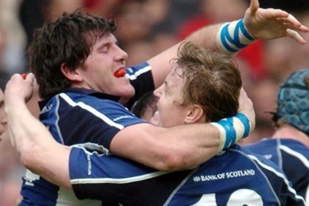 Brian O'driscoll of Leinster, right, and teammate Shane  Horgan react after Leinster won their quarterfinal match of the European Rugby Cup against Toulouse, Saturday, April 1, 2006 in Toulouse, southwestern France. Leinster defeated Toulouse 41-33. (AP Photo/Remy Gabalda)