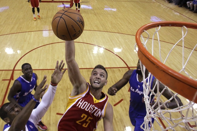 Houston Rockets forward Chandler Parsons (25) takes a shot during the first half of an NBA basketball game against the Los Angeles Clippers, Saturday, March 29, 2013, in Houston. (AP Photo/Patric Schneider)