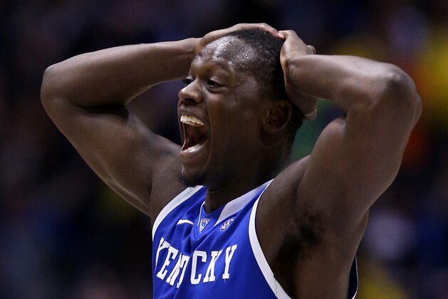 INDIANAPOLIS, IN - MARCH 30: Julius Randle #30 of the Kentucky Wildcats celebrates after defeating the Michigan Wolverines 75 to 72 in the midwest regional final of the 2014 NCAA Men's Basketball Tournament at Lucas Oil Stadium on March 30, 2014 in Indianapolis, Indiana. (Photo by Jonathan Daniel/Getty Images) INDIANAPOLIS, IN - MARCH 30: Julius Randle #30 of the Kentucky Wildcats celebrates after defeating the Michigan Wolverines 75 to 72 in the midwest regional final of the 2014 NCAA Men's Basketball Tournament at Lucas Oil Stadium on March 30, 2014 in Indianapolis, Indiana. (Photo by Jonathan Daniel/Getty Images)