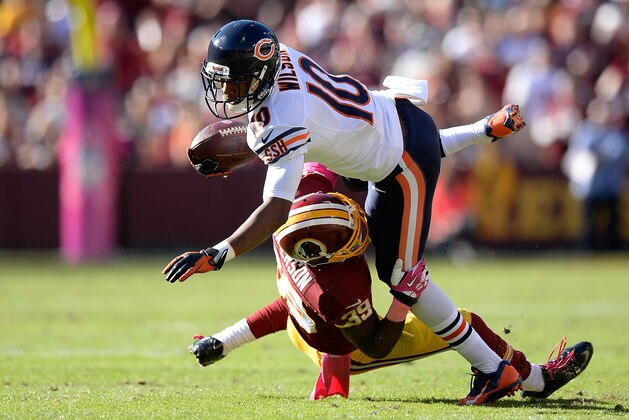 LANDOVER, MD - OCTOBER 20:  Marquess Wilson #10 of the Chicago Bears is tackled by David Amerson #39 of the Washington Redskins in the third quarter during an NFL game at FedExField on October 20, 2013 in Landover, Maryland.  (Photo by Patrick McDermott/Getty Images)