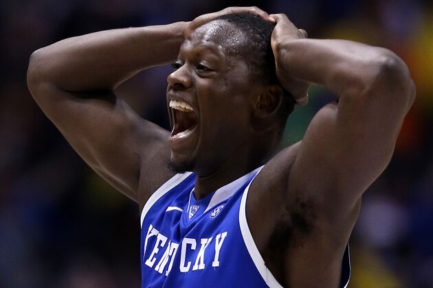 INDIANAPOLIS, IN - MARCH 30:  Julius Randle #30 of the Kentucky Wildcats celebrates after defeating the Michigan Wolverines 75 to 72 in the midwest regional final of the 2014 NCAA Men's Basketball Tournament at Lucas Oil Stadium on March 30, 2014 in Indianapolis, Indiana.  (Photo by Jonathan Daniel/Getty Images)