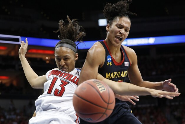Louisville forward Cortnee Walton (13) and Maryland forward Alyssa Thomas scramble for a rebound during the first half of a regional final in the NCAA women's college basketball tournament, Tuesday, April 1, 2014, in Louisville, Ky. (AP Photo/John Bazemore)