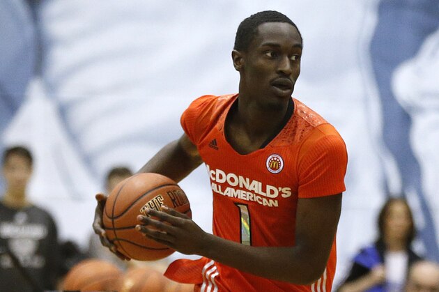 McDonald's East All-American Theo Pinson, of Greensboro, N.C., competes in the skills contest during the McDonald's All-American Jam Fest at the University of Chicago in Chicago, on Monday, March 31, 2014. (AP Photo/Andrew A. Nelles)