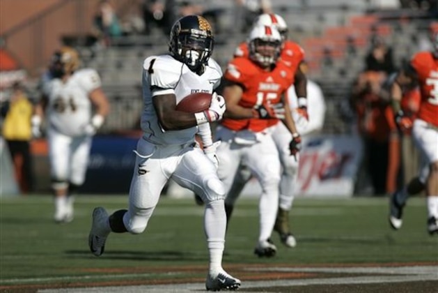 Kent State's Dri Archer (1) runs the ball into the end zone on a 79-yard run during the first half of an NCAA college football game against Bowling Green, , Saturday, Nov. 17, 2012, in Bowling Green, Ohio. (AP Photo/J.D. Pooley)