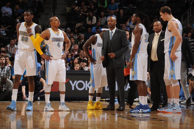 DENVER, CO - March 31: Head Coach Brian Shaw of the Denver Nuggets looks on against the Memphis Grizzlies on March 31, 2014 at the Pepsi Center in Denver, Colorado. NOTE TO USER: User expressly acknowledges and agrees that, by downloading and/or using this Photograph, user is consenting to the terms and conditions of the Getty Images License Agreement. Mandatory Copyright Notice: Copyright 2014 NBAE (Photo by Bart Young/NBAE via Getty Images)