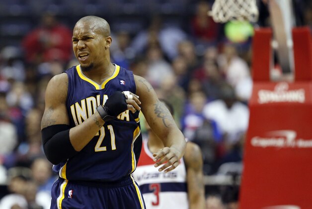 Indiana Pacers forward David West (21) reacts after a foul call in the first half of an NBA basketball game against the Washington Wizards, Friday, March 28, 2014, in Washington. (AP Photo/Alex Brandon)