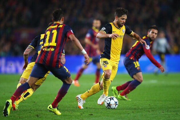 BARCELONA, SPAIN - APRIL 01: Diego of Club Atletico de Madrid breaks forward during the UEFA Champions League Quarter Final first leg match between FC Barcelona and Club Atletico de Madrid at Camp Nou on April 1, 2014 in Barcelona, Spain.  (Photo by Clive Rose/Getty Images)