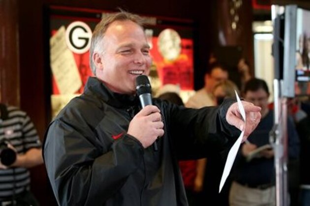 Georgia football coach Mark Richt answers questions from fans about Georgia's recruiting class on national signing day Wednesday, Feb. 5, 2014, in Athens, Ga. (AP Photo/Jason Getz)