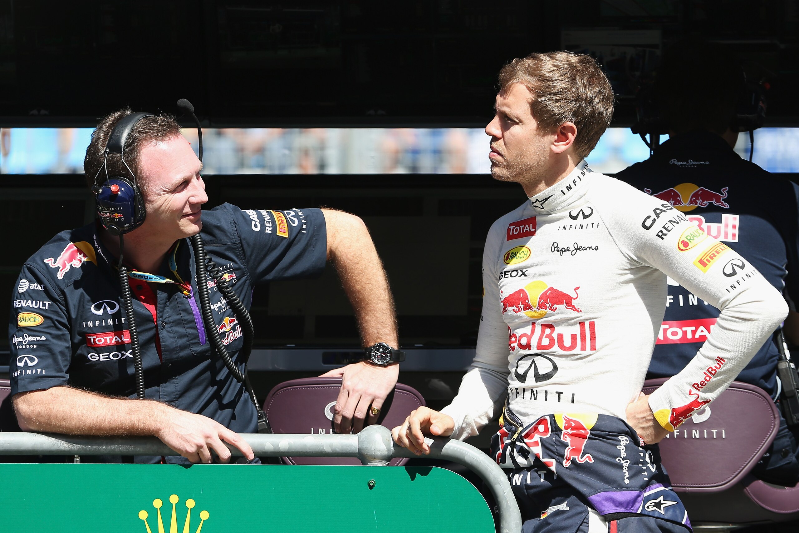 MELBOURNE, AUSTRALIA - MARCH 14:  Sebastian Vettel of Germany and Infiniti Red Bull Racing and his Team Principal Christian Horner are seen on the pitwall during practice for the Australian Formula One Grand Prix at Albert Park on March 14, 2014 in Melbourne, Australia.  (Photo by Mark Thompson/Getty Images)