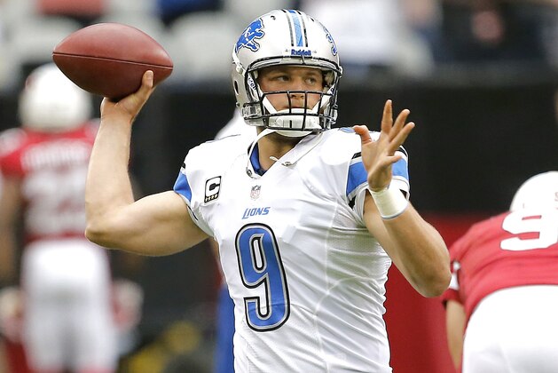 Detroit Lions quarterback Matthew Stafford (9) warms up prior to a NFL football game against the Arizona Cardinals, Sunday, Sept. 15, 2013, in Glendale, Ariz. (AP Photo/Matt York)