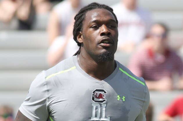 South Carolina defensive end Jadeveon Clowney competes in a drill for NFL representatives at South Carolina football pro day in Columbia, S.C., Wednesday, April 2, 2014. (AP Photo/Mary Ann Chastain)