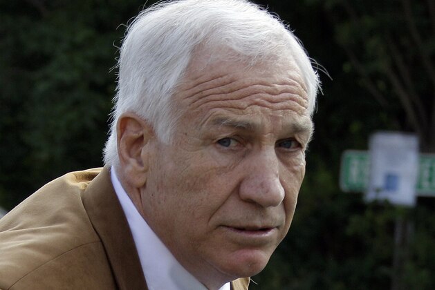 FILE - In this June 22, 2012 file photo, former Penn State assistant football coach Jerry Sandusky arrives at the Centre County Courthouse in Bellefonte, Pa. Sandusky is expected to participate in the proceeding to have his Penn State pension restored by video conference. The proceeding begins on Tuesday, Jan. 7, 2014. Sandusky lost a $4,900-a-month pension in October 2012, when he was sentenced to 30 to 60 years in prison for child sexual abuse. (AP Photo/Gene J. Puskar, File)