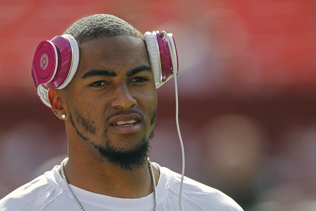 Philadelphia Eagles wide receiver DeSean Jackson looks across the field with pink headphones before a NFL football game against the Washington Redskins in Landover, Md., Sunday, Oct. 16, 2011. (AP Photo/Evan Vucci)