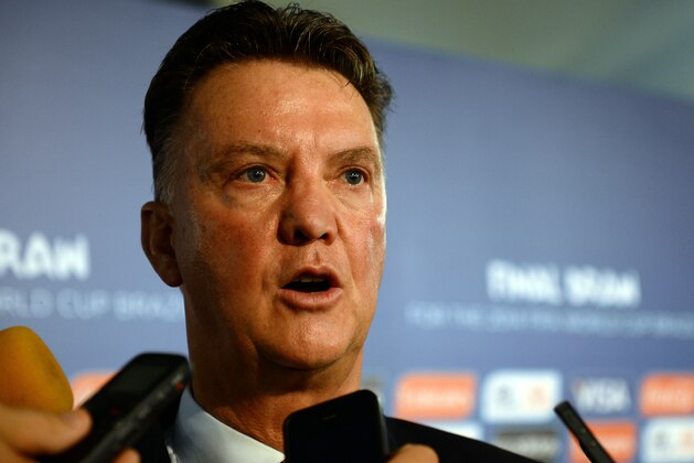 COSTA DO SAUIPE, BRAZIL - DECEMBER 06:  Netherlands coach Louis van Gaal speaks to members of the media after the Final Draw for the 2014 FIFA World Cup Brazil at Costa do Sauipe Resort on December 6, 2013 in Costa do Sauipe, Bahia, Brazil.  (Photo by Buda Mendes/Getty Images)