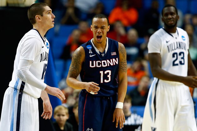 BUFFALO, NY - MARCH 22:  Shabazz Napier #13 of the Connecticut Huskies reacts against the Villanova Wildcats during the third round of the 2014 NCAA Men's Basketball Tournament at the First Niagara Center on March 22, 2014 in Buffalo, New York.  (Photo by Jared Wickerham/Getty Images)