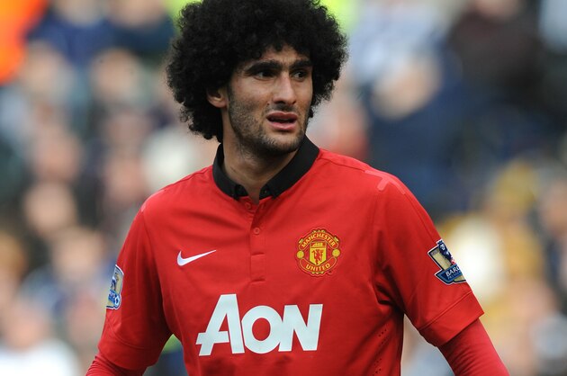Manchester United's Marouane Fellaini  during the English Premier League soccer match between West Bromwich Albion and Manchester United at The Hawthorns Stadium in West Bromwich, England, Saturday, March 8, 2014.  (AP Photo/Rui Vieira)