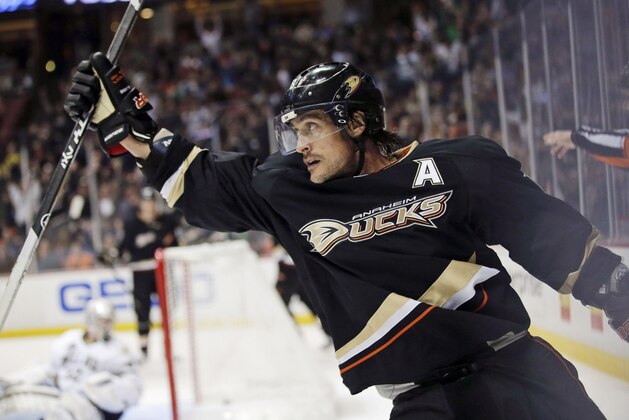 FILE - In this April 3, 2013, file photo, Anaheim Ducks' Teemu Selanne, of Finland, celebrates his goal against the Dallas Stars during the second period of an NHL hockey game in Anaheim, Calif.. Selanne says he's returning to the Ducks for his 21st and final NHL season. (AP Photo/Jae C. Hong, File)