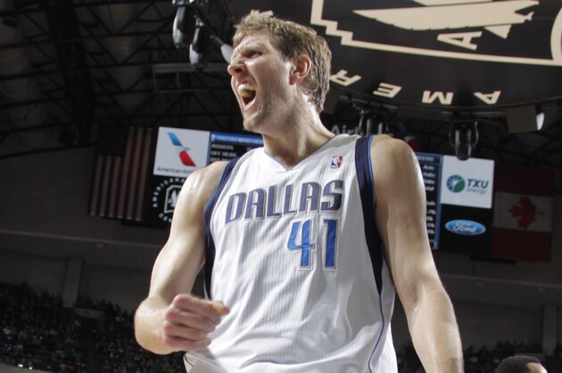 DALLAS, TX - MARCH 9: Dirk Nowitzki #41 of the Dallas Mavericks celebrates on the court during a game against the Indiana Pacers on March 9, 2014 at the American Airlines Center in Dallas, Texas. NOTE TO USER: User expressly acknowledges and agrees that, by downloading and or using this photograph, User is consenting to the terms and conditions of the Getty Images License Agreement. Mandatory Copyright Notice: Copyright 2014 NBAE (Photo by Danny Bollinger/NBAE via Getty Images)