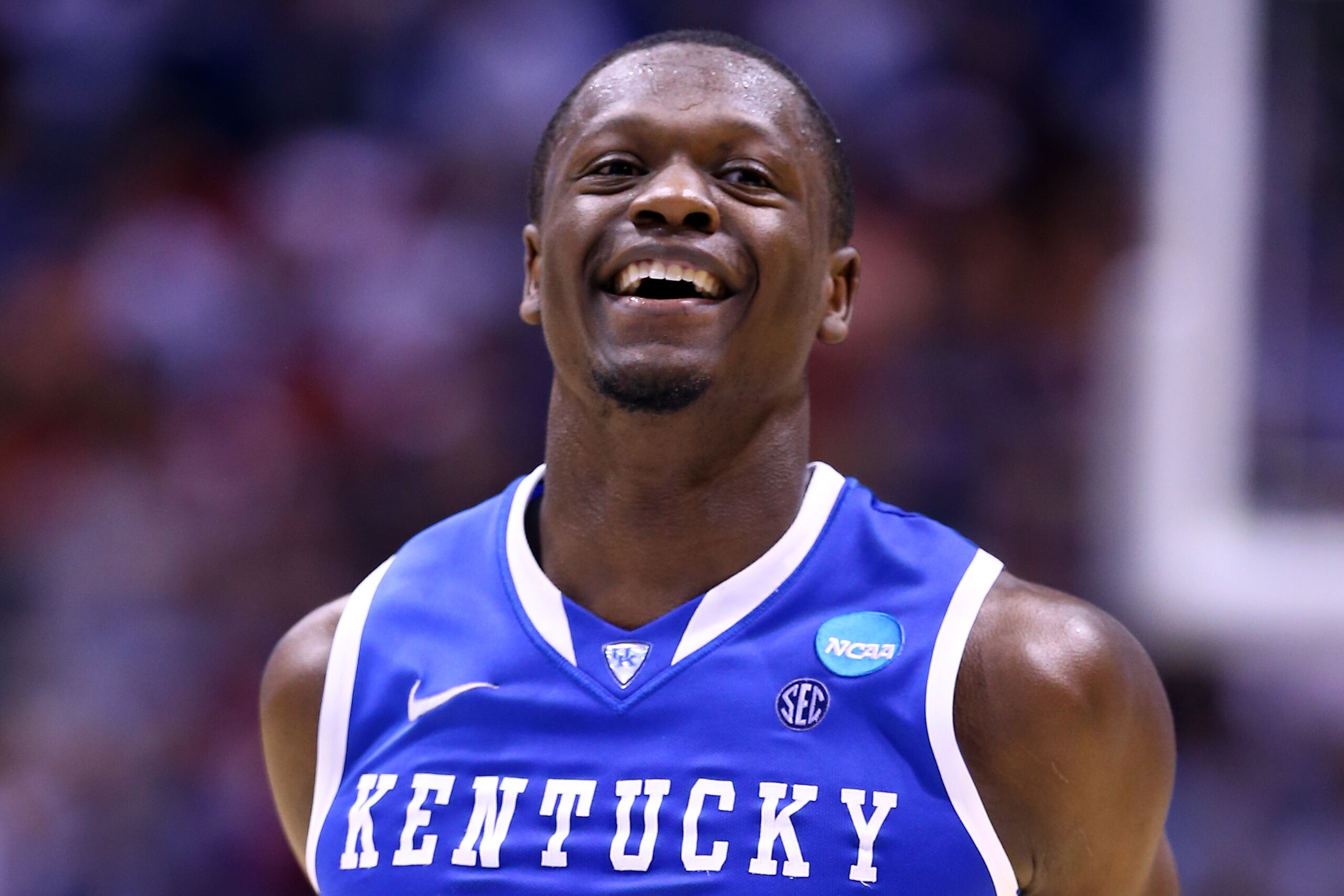 INDIANAPOLIS, IN - MARCH 28:  Julius Randle #30 of the Kentucky Wildcats celebrates defeating the Louisville Cardinals 74 to 69 during the regional semifinal of the 2014 NCAA Men's Basketball Tournament at Lucas Oil Stadium on March 28, 2014 in Indianapolis, Indiana.  (Photo by Andy Lyons/Getty Images)