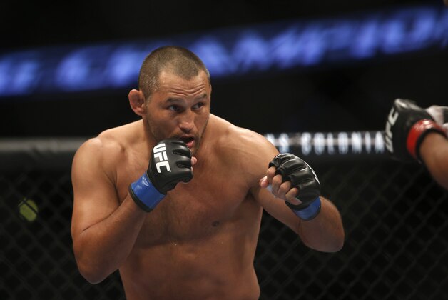 Lyoto Machida Dan Henderson during their UFC 157 light heavyweight mixed martial arts match in Anaheim, Calif., Saturday, Feb. 23, 2013. Machida won by split decision after the third round. (AP Photo/Jae C. Hong) Lyoto Machida Dan Henderson during their UFC 157 light heavyweight mixed martial arts match in Anaheim, Calif., Saturday, Feb. 23, 2013. Machida won by split decision after the third round. (AP Photo/Jae C. Hong)
