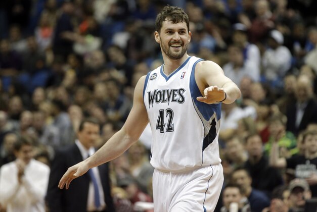 Minnesota Timberwolves' Kevin Love , left, congratulates Corey Brewer after Brewer's dunk in the first quarter of an NBA basketball game against the Detroit Pistons, Friday, March 7, 2014, in Minneapolis. (AP Photo/Jim Mone) Minnesota Timberwolves' Kevin Love , left, congratulates Corey Brewer after Brewer's dunk in the first quarter of an NBA basketball game against the Detroit Pistons, Friday, March 7, 2014, in Minneapolis. (AP Photo/Jim Mone)