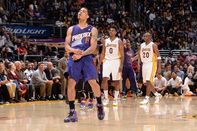 LOS ANGELES, CA - MARCH 30: Gerald Green #14 of the Phoenix Suns reacts during a game against the Los Angeles Lakers at STAPLES Center on March 30, 2014 in Los Angeles, California. NOTE TO USER: User expressly acknowledges and agrees that, by downloading and/or using this Photograph, user is consenting to the terms and conditions of the Getty Images License Agreement. Mandatory Copyright Notice: Copyright 2014 NBAE (Photo by Andrew D. Bernstein/NBAE via Getty Images)