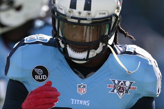 Tennessee Titans running back Chris Johnson warms up before an NFL football game between the Titans and the Houston Texans Sunday, Dec. 29, 2013, in Nashville, Tenn. (AP Photo/Wade Payne)