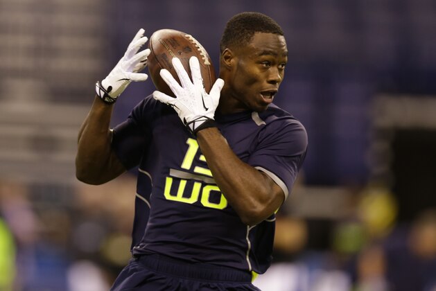 Oregon State wide receiver Brandin Cooks makes a catch during a drill at the NFL football scouting combine in Indianapolis, Sunday, Feb. 23, 2014. (AP Photo/Michael Conroy)