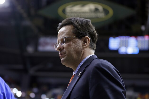 Indiana head coach Tom Crean walks off the court after an NCAA college basketball game against Illinois in the first round of the Big Ten Conference tournament Thursday, March 13, 2014, in Indianapolis. Illinois won 64-54. (AP Photo/Michael Conroy)