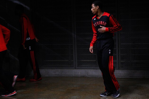 Toronto Raptors guard DeMar DeRozan, right prepares to take the court before the first half of an NBA basketball game against the New Orleans Pelicans in New Orleans, Wednesday, March 19, 2014. The Raptors won 107-100. (AP Photo/Jonathan Bachman)