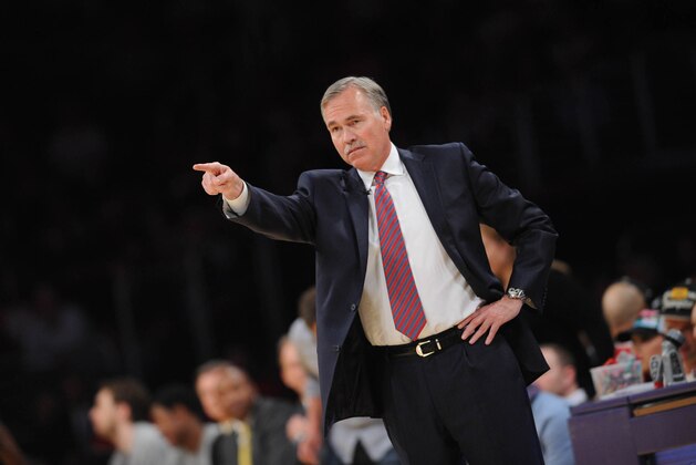 LOS ANGELES, CA - MARCH 19: Head coach Mike D'Antoni of the Los Angeles Lakers directs his team during a game against the San Antonio Spurs at Staples Center on March 19, 2014 in Los Angeles, California. NOTE TO USER: User expressly acknowledges and agrees that, by downloading and/or using this Photograph, user is consenting to the terms and conditions of the Getty Images License Agreement. Mandatory Copyright Notice: Copyright 2014 NBAE (Photo by Noah Graham/NBAE via Getty Images)