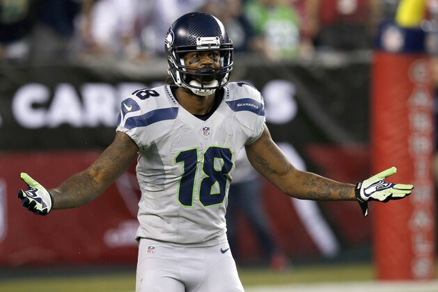 Seattle Seahawks wide receiver Sidney Rice looks for the call against the Arizona Cardinals during the first half of an NFL football game, Thursday, Oct. 17, 2013, in Glendale, Ariz. (AP Photo/Ross D. Franklin)