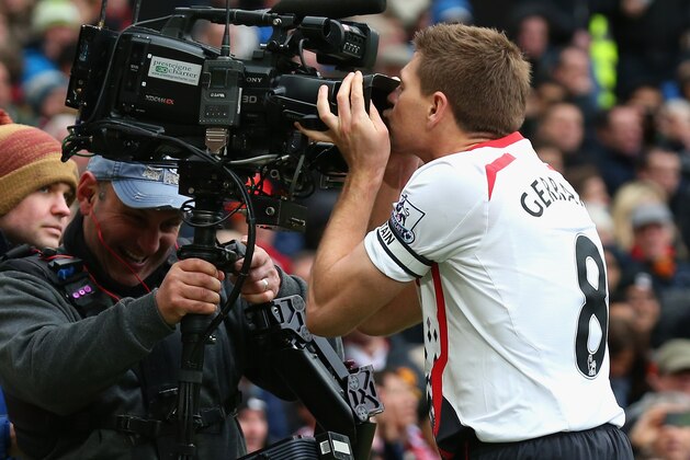 MANCHESTER, ENGLAND - MARCH 16: Steven Gerrard of Liverpool celebrates scoring the second goal by kissing the steadicam during the Barclays Premier League match between Manchester United and Liverpool at Old Trafford on March 16, 2014 in Manchester, England. (Photo by Alex Livesey/Getty Images) MANCHESTER, ENGLAND - MARCH 16: Steven Gerrard of Liverpool celebrates scoring the second goal by kissing the steadicam during the Barclays Premier League match between Manchester United and Liverpool at Old Trafford on March 16, 2014 in Manchester, England. (Photo by Alex Livesey/Getty Images)