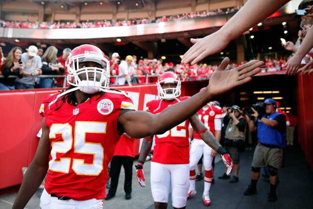 KANSAS CITY, MO - OCTOBER 20: Running back Jamaal Charles #25  of the Kansas City Chiefs high-fives fans prior to the game against the Houston Texans at Arrowhead Stadium on October 20, 2013 in Kansas City, Missouri.  (Photo by Jamie Squire/Getty Images)