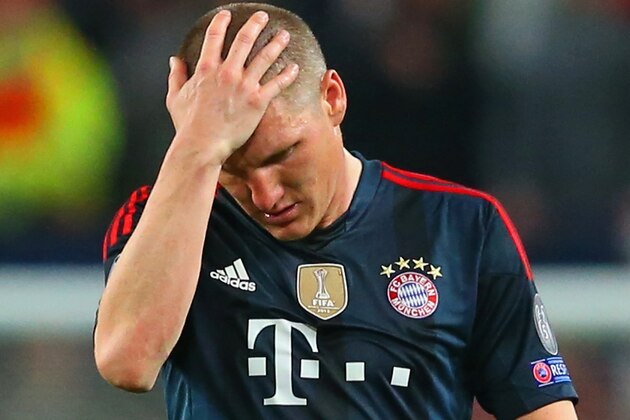 MANCHESTER, ENGLAND - APRIL 01:  A dejected Bastian Schweinsteiger of Bayern Muenchen holds his head after he was shown a red card during the UEFA Champions League Quarter Final first leg match between Manchester United and FC Bayern Muenchen at Old Trafford on April 1, 2014 in Manchester, England.  (Photo by Alex Livesey/Getty Images)