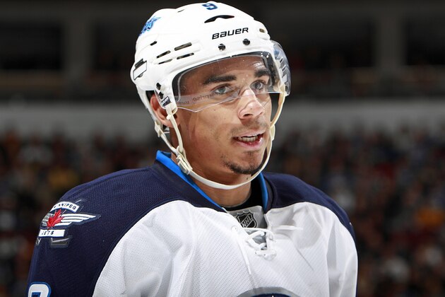VANCOUVER, BC - DECEMBER 22:  Evander Kane #9 of the Winnipeg Jets looks to the bench during their NHL game against the Vancouver Canucks at Rogers Arena December 22, 2013 in Vancouver, British Columbia, Canada. Vancouver won 2-1. (Photo by Jeff Vinnick/NHLI via Getty Images)