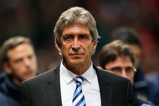 MANCHESTER, ENGLAND - MARCH 25:  Manchester City Manager Manuel Pellegrini looks on prior to the Barclays Premier League match between Manchester United and Manchester City at Old Trafford on March 25, 2014 in Manchester, England.  (Photo by Alex Livesey/Getty Images)