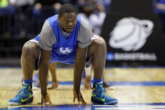 Kentucky's Julius Randle stretches during practice for their NCAA Midwest Regional semifinal college basketball tournament game Thursday, March 27, 2014, in Indianapolis. Kentucky plays Louisville on Friday, March 28, 2013. (AP Photo/Michael Conroy) Kentucky's Julius Randle stretches during practice for their NCAA Midwest Regional semifinal college basketball tournament game Thursday, March 27, 2014, in Indianapolis. Kentucky plays Louisville on Friday, March 28, 2013. (AP Photo/Michael Conroy)