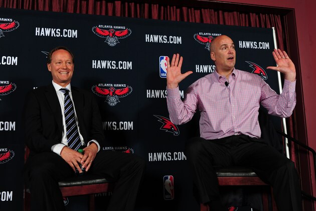 ATLANTA, GA - MAY 29: Mike Budenholzer (L) is introduced by General Manager Danny Ferry as the new Head Coach of the Atlanta Hawks during a press conference on May 29, 2013 at Philips Arena in Atlanta, Georgia.  NOTE TO USER: User expressly acknowledges and agrees that, by downloading and/or using this Photograph, user is consenting to the terms and conditions of the Getty Images License Agreement. Mandatory Copyright Notice: Copyright 2013 NBAE (Photo by Scott Cunningham/NBAE via Getty Images)