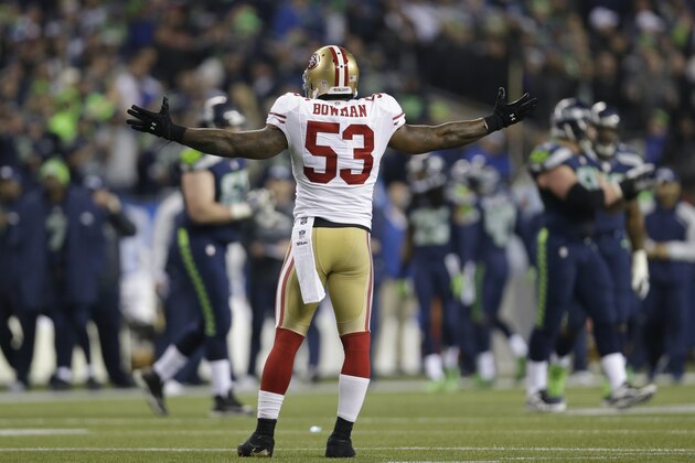 San Francisco 49ers' NaVorro Bowman reacts to play against the Seattle Seahawks during the first half of the NFL football NFC Championship game Sunday, Jan. 19, 2014, in Seattle. (AP Photo/Marcio Jose Sanchez)