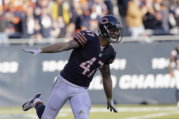 Chicago Bears free safety Chris Conte (47) celebrates after intercepting a pass thrown by Detroit Lions quarterback Matthew Stafford (9) during the second half of an NFL football game, Sunday, Nov. 10, 2013, in Chicago. (AP Photo/Nam Y. Huh)