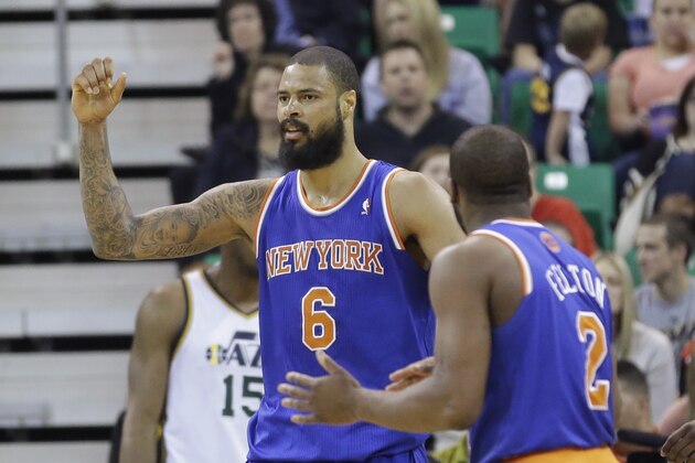New York Knicks' Tyson Chandler (6) celebrates with teammate New York Knicks' Raymond Felton (2) after scoring against the Utah Jazz in the second half during an NBA basketball game Monday, March 31, 2014, in Salt Lake City. (AP Photo/Rick Bowmer)