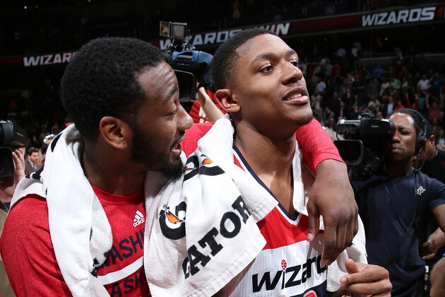 WASHINGTON, DC - APRIL 2: John Wall #2 and Bradley Beal #3 of the Washington Wizards celebrate clinching a playoff berth after the game against the Boston Celtics at the Verizon Center on April 2, 2014 in Washington, DC. NOTE TO USER: User expressly acknowledges and agrees that, by downloading and or using this photograph, User is consenting to the terms and conditions of the Getty Images License Agreement. Mandatory Copyright Notice: Copyright 2014 NBAE (Photo by Ned Dishman/NBAE via Getty Images)